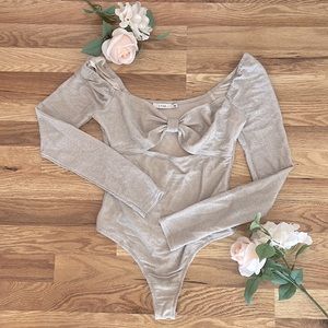 Lush Shimmery Cream Bow Cut-Out Body Suit